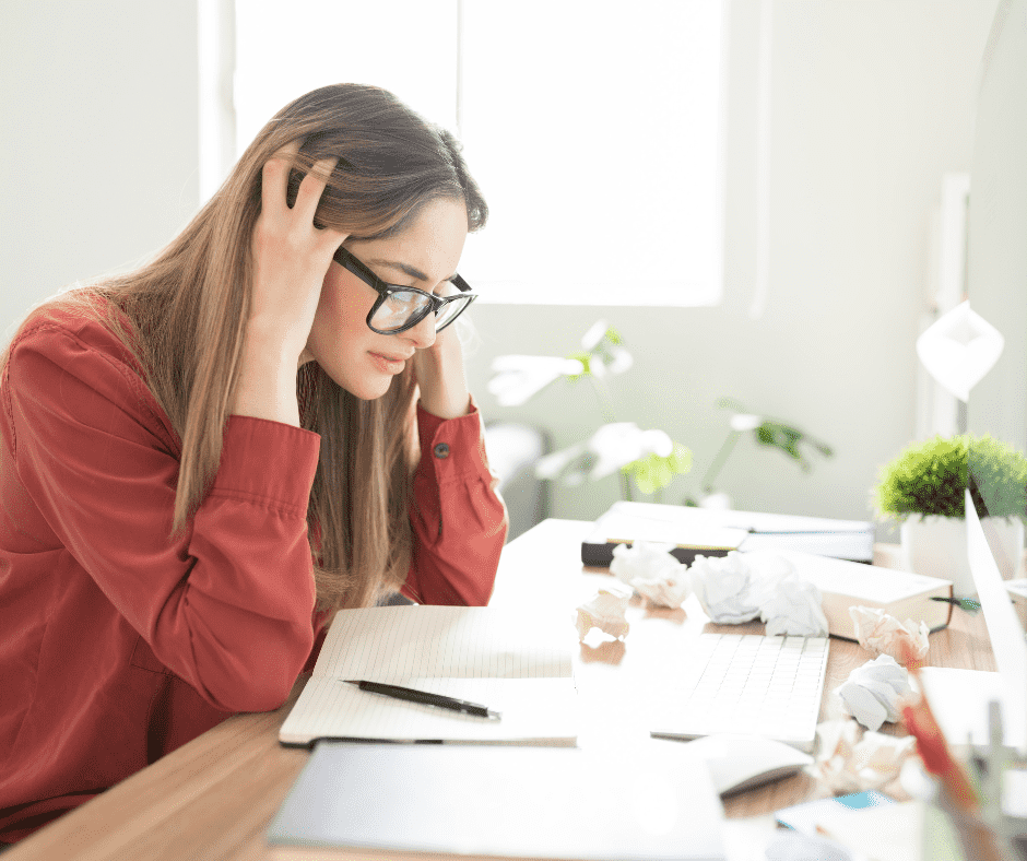 Business woman, out of alignment, something feels off