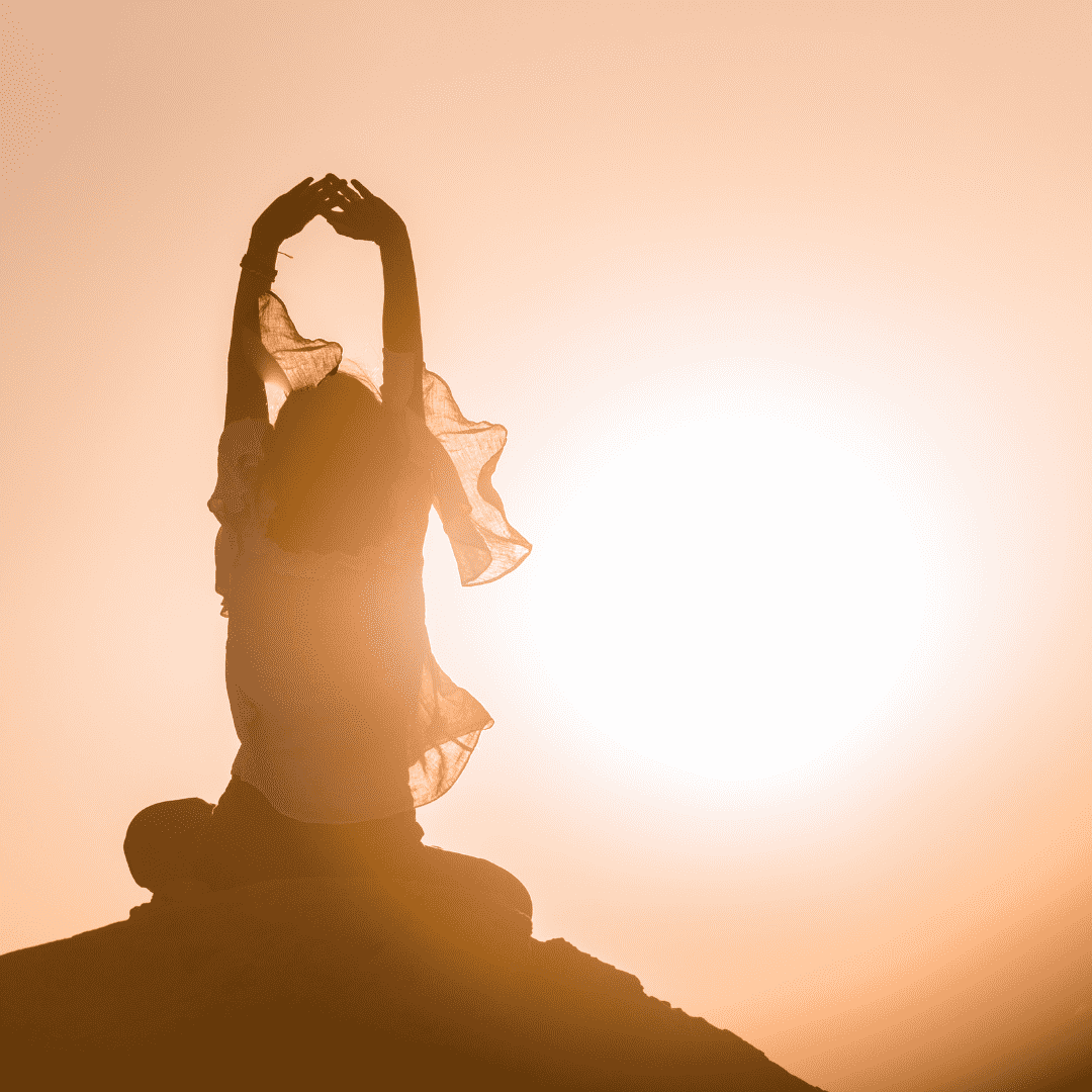 A woman stretching to the sun, divine timing